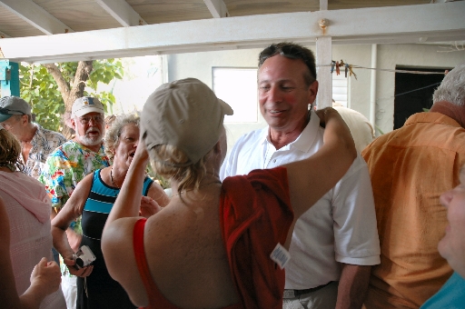 Jeff gets a hug from Debra, Bill and Di look on 